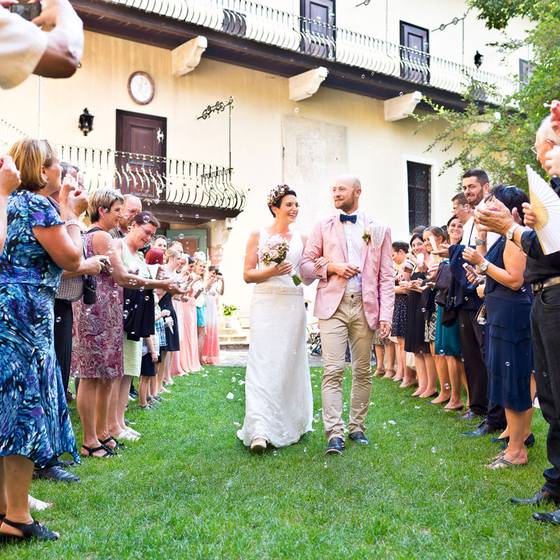 Happy bridal couple at the courtyard